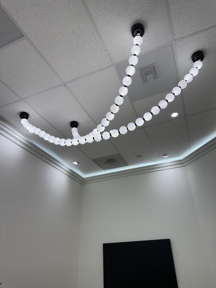 Modern bubble pendant light fixture installed on ceiling